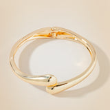 Azade Μεταλλική Χειροπέδα σε Χρυσό Χρώμα